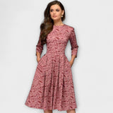 Retrozo - Cremefarbenes knielanges Kleid mit Blüten