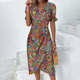 Rita - Graues Wickelkleid mit Tupfenmuster